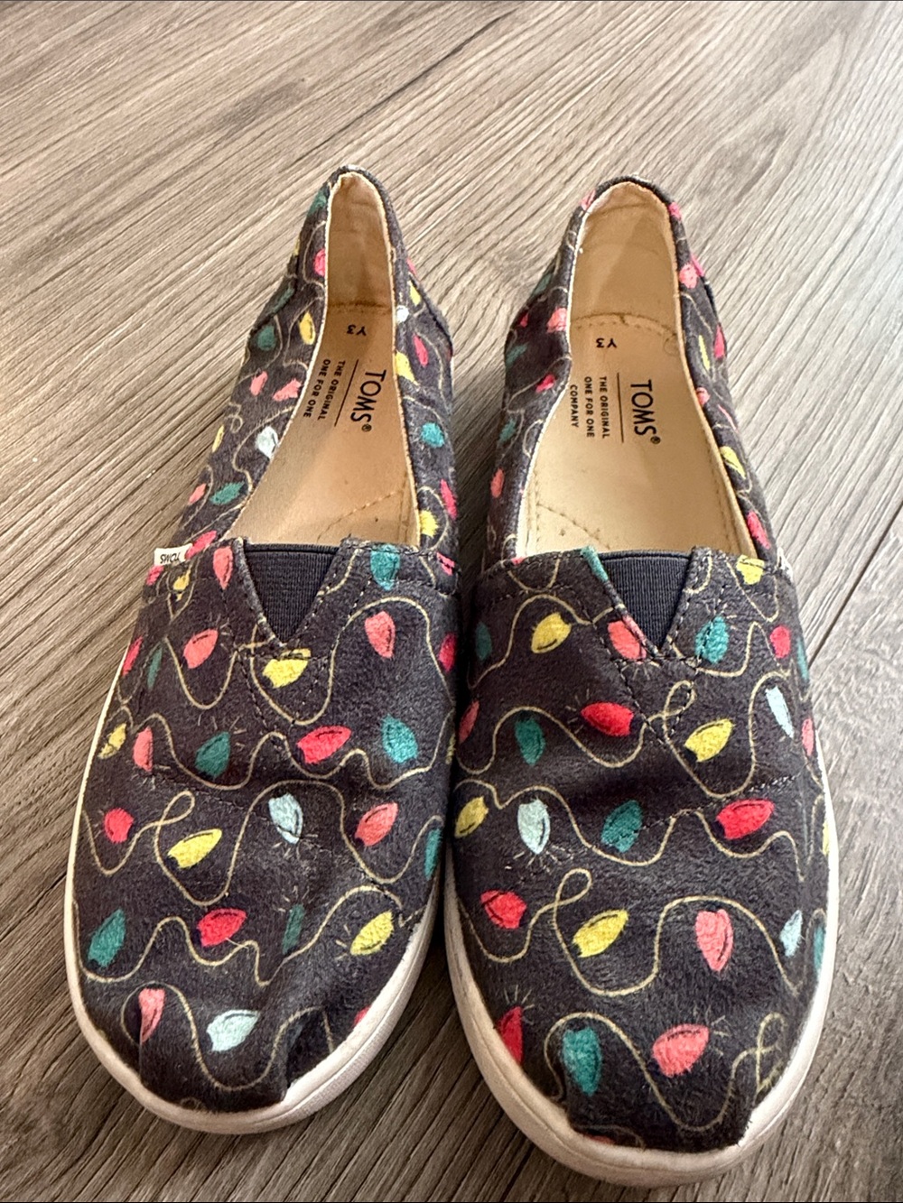TOMS Black Slip-On Moccasins with Multicolor Leaf Accents